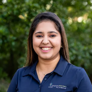 A smiling IntegratePHYSIO clinician